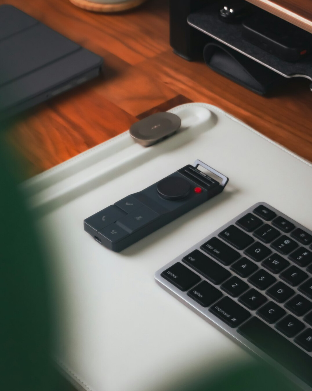 Voice recorder and notebook on a table for an interview