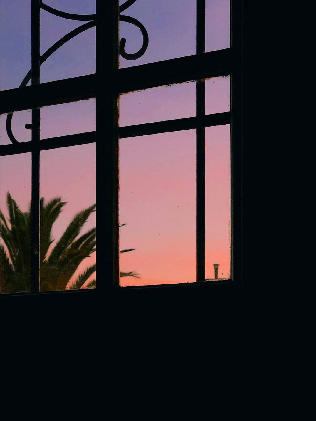 Dusk street in old Montevideo with a lone silhouette