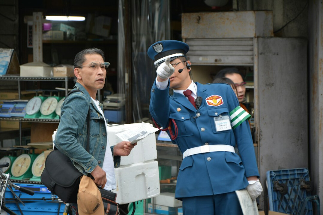 store security guard watching customers